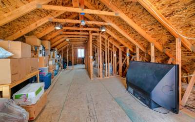 Inspecting an attic for pests in Wisconsin - Batzner Pest Control