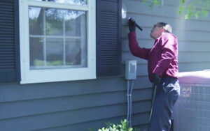 technician inspecting home by Batzner Pest Control in Wisconsin