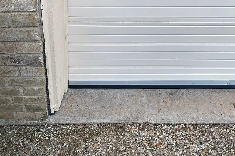 Garage door that has had the bottom gap sealed with Flexi Armour