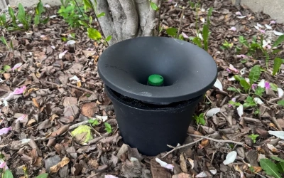 Photo of a Wisconsin residents backyard In2Care installation placed amongst a pile of leaves.